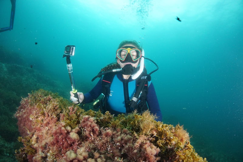A scuba diver using a GoPro.
