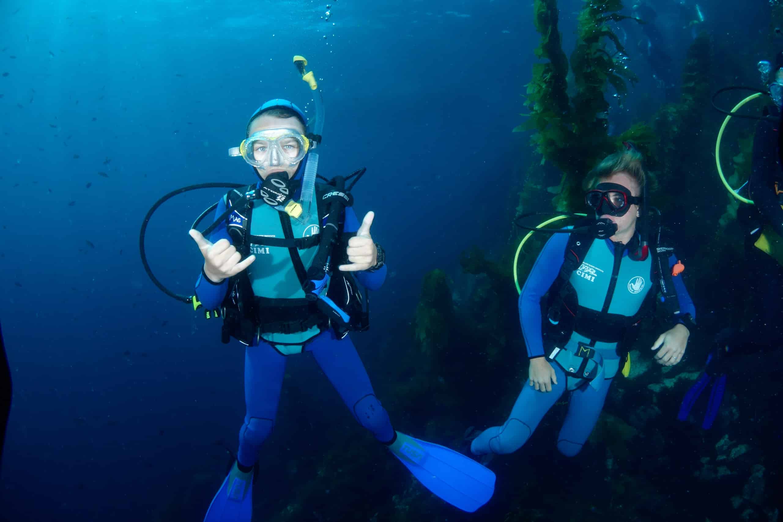 Two campers scuba diving.